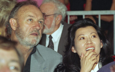 Gene Hackman and Betsy Arakawa attending a public event together.